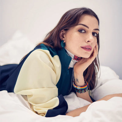 Rainbow LOVE bracelet on Anne Hathaway's cover story for Glamour Magazine Devil Wears Prada