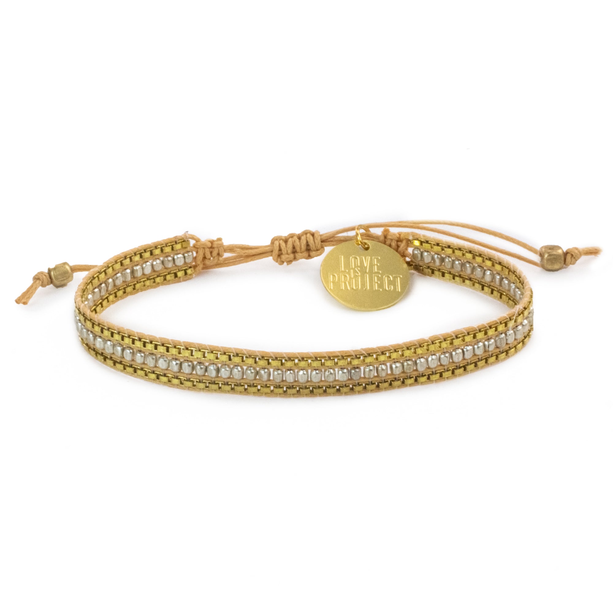 A gold beaded string bracelet